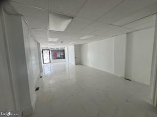 Move-in ready commercial retail space available immediately on highly visible Old York Rd corridor in Logan/Fern Rock. This ±800–9,000 SF ground-floor storefront offers excellent signage exposure, strong foot traffic, and versatile use potential. Ideal for grocery, convenience, salon/barber, smoke shop, wireless store, nonprofit office, medical or professional use.
Key Features:
White-boxed and fully renovated: brand-new marble-look tile flooring, fresh drywall and paint, modern drop ceiling with LED panel lighting
-Glass storefront entry with roll-down security shutters
-Private ADA-compliant restroom already built
-Existing awning ready for tenant signage
-Open layout: approx. 15' W x 55' D
Transit & Foot Traffic Highlights:
-Just 1 block from Broad St (Route 611)
-4 minutes to Olney Transportation Center
-Surrounded by schools, churches, daycares, and Einstein Medical Center
-Heavy bus, vehicle, and pedestrian activity in the corridor
Utilities:
-Separately metered electric and gas
-Tenant-controlled
Lease Details:
-$1,600/month Gross Lease
-3–5 year lease preferred
-Owner may offer tenant improvement (TI) allowance for qualified users
-Zoning: CMX-2 – allows wide range of neighborhood-serving retail and office uses
Available Now – Schedule Your Tour
Bring your retail or office concept and get up and running quickly. Excellent opportunity for growing businesses looking for affordable commercial space in North Philadelphia with strong visibility.