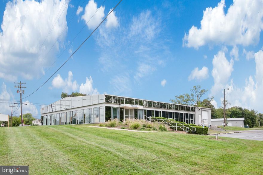 Prime commercial opportunity available just off Route 50. This high-visibility retail location offers exceptional exposure to heavy traffic, making it perfect for businesses looking to attract attention. The property features a spacious retail floor with plenty of natural light, expansive warehouse space for storage and operations, and ample parking available for both customers and staff. Conveniently located near major roads for easy access and deliveries, this versatile space is ideal for businesses looking to expand or establish a new presence.