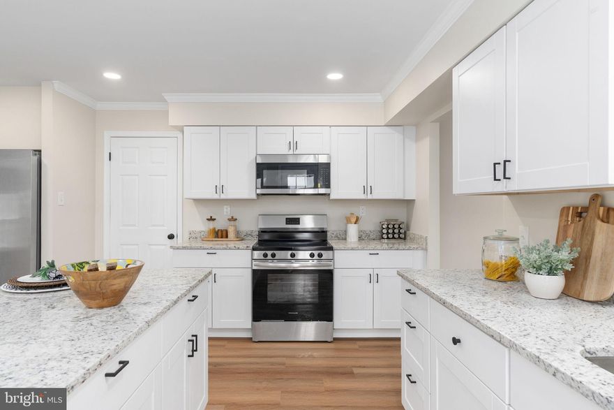 NEW, NEW, NEW SO MUCH NEW! SCHEDULE YOUR SHOWING TODAY!🤩 Bring all offers, seller would like to close ASAP! Home shows even more beautiful in person. With over $120,000 in recent updates this Expansive home is in the Sought-After Graham Park Shores with NO HOA, TWO car garage 🚘 AND sits on almost a half acre corner lot. 🌲 🍃 
This property combines comfort, privacy and convenience. Inside you will find a bright spacious kitchen with **NEW Stainless-Steel appliances, New Glass door, New Granite Countertops, New White Cabinetry, Island, large sink & pantry. ✨Walk outside onto your deck from your kitchen to grill out 🍔 or just to simply unwind and enjoy your favorite beverage on your private wooded lot.  🪵 
This home also features a formal dining area making it perfect for entertainers to host during holidays & birthdays. 🎉 A bright and airy living room with a large picture perfect window. 🪟 Additionally you will also find a dedicated office with french doors & large closet. (This space could also be used as a 5th bedroom (NTC) on the main level) 🛏️  There is also a spacious family room with a warm & cozy fireplace, 🔥 half bath, great sized laundry room AND sitting room area with ****NEW sliding glass door (could also be a great space for ones with a green thumb. Lots of natural sunlight! ☀️🪴 
  On the main level you also have access to your TWO car garage making life a breeze to bring in the groceries. 🚘 Upstairs the large primary suite is a true retreat , featuring acess to a sitting room/office space or nursery, a spacious walk-in closet, & a FULLY remodeled full bath, with ***NEW 72 INCH DOUBLE VANITY, NEW toilet, A ***NEW PREMIUM tile shower with a niche & bench,  glass shower door, and gleaming tile floors. 🛁 🧼 
Upstairs you will also find 3 additional generously sized bedrooms & another ***Remodeled  FULL bathroom, NEW tub with premium tile walls, rich tile floors, NEW vanity, & New toilet.  🛀 
The spacious basement expands your rec room creating the perfect space for entertaining, hosting guest, or extended family.  🛋️ 
******IMPORTANT NEW UPDATES INCLUDE a 5 TON HVAC SYSTEM, NEW carpet & luxury vinyl plank flooring throughout, Recess lighting, switches & cover plates, Neutral Colored Paint throughout, New hot water heater, NEW front & back door, NEW wainscoting, NEW light fixtures & Mirrors. This home offers the best of both worlds—plenty of space and privacy, yet close to Quantico, major commuter routes, and shopping. 🛍️ With so much to offer, this Graham Park Shores home is ready for its next chapter! Enjoy Vacation at Home with a walk to the Potomac & all of the wonderful amenities in the area. From world-class shopping and Dining at Stonebridge Potomac Town Center, The Rose Gaming Resort, Wegmans, and Potomac Mills Mall. Less than 5 miles to the VRE, a Great Commuter Location. Easy Access to I95, RTE 1, MCB Quantico, Metro bus, Park n Ride, take VRE to Ft Belvoir & Pentagon and new DOD Facilities, or catch the Commuter Bus to DC. So close to Parks, Quantico hiking trails, and Quantico Creek! The owner has put in so much LOVE & thought into making this home great for the new owners bring your offers! As this home is ready for its next chapter. 🏡 🔑