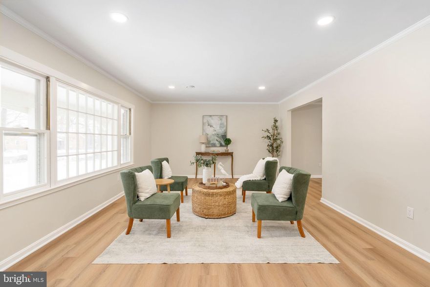 Officially on the market FRIDAY 2/6 SCHEDULE YOUR SHOWING TODAY!🤩 Home shows even more beautiful in person. With over $120,000 in recent updates this Expansive home is in the Sought-After Graham Park Shores with NO HOA, TWO car garage 🚘 AND sits on almost a half acre corner lot. 🌲 🍃 
This property combines comfort, privacy and convenience. Inside you will find a bright spacious kitchen with **NEW Stainless-Steel appliances, New Glass door, New Granite Countertops, New White Cabinetry, Island, large sink & pantry. ✨Walk outside onto your deck from your kitchen to grill out 🍔 or just to simply unwind and enjoy your favorite beverage on your private wooded lot.  🪵 
This home also features a formal dining area making it perfect for entertainers to host during holidays & birthdays. 🎉 A bright and airy living room with a large picture perfect window. 🪟 Additionally you will also find a dedicated office with french doors & large closet. (This space could also be used as a 5th bedroom (NTC) on the main level) 🛏️  There is also a spacious family room with a warm & cozy fireplace, 🔥 half bath, great sized laundry room AND sitting room area with ****NEW sliding glass door (could also be a great space for ones with a green thumb. Lots of natural sunlight! ☀️🪴 
  On the main level you also have access to your TWO car garage making life a breeze to bring in the groceries. 🚘 Upstairs the large primary suite is a true retreat , featuring acess to a sitting room/office space or nursery, a spacious walk-in closet, & a FULLY remodeled full bath, with ***NEW 72 INCH DOUBLE VANITY, NEW toilet, A ***NEW PREMIUM tile shower with a niche & bench,  glass shower door, and gleaming tile floors. 🛁 🧼 
Upstairs you will also find 3 additional generously sized bedrooms & another ***Remodeled  FULL bathroom, NEW tub with premium tile walls, rich tile floors, NEW vanity, & New toilet.  🛀 
The spacious basement expands your rec room creating the perfect space for entertaining, hosting guest, or extended family.  🛋️ 
******IMPORTANT NEW UPDATES INCLUDE a 5 TON HVAC SYSTEM, NEW carpet & luxury vinyl plank flooring throughout, Recess lighting, switches & cover plates, Neutral Colored Paint throughout, New hot water heater, NEW front & back door, NEW wainscoting, NEW light fixtures & Mirrors. This home offers the best of both worlds—plenty of space and privacy, yet close to Quantico, major commuter routes, and shopping. 🛍️ With so much to offer, this Graham Park Shores home is ready for its next chapter! Enjoy Vacation at Home with a walk to the Potomac & all of the wonderful amenities in the area. From world-class shopping and Dining at Stonebridge Potomac Town Center, The Rose Gaming Resort, Wegmans, and Potomac Mills Mall. Less than 5 miles to the VRE, a Great Commuter Location. Easy Access to I95, RTE 1, MCB Quantico, Metro bus, Park n Ride, take VRE to Ft Belvoir & Pentagon and new DOD Facilities, or catch the Commuter Bus to DC. So close to Parks, Quantico hiking trails, and Quantico Creek! The owner has put in so much LOVE & thought into making this home great for the new owners as this home is ready for its next chapter. 🏡 🔑