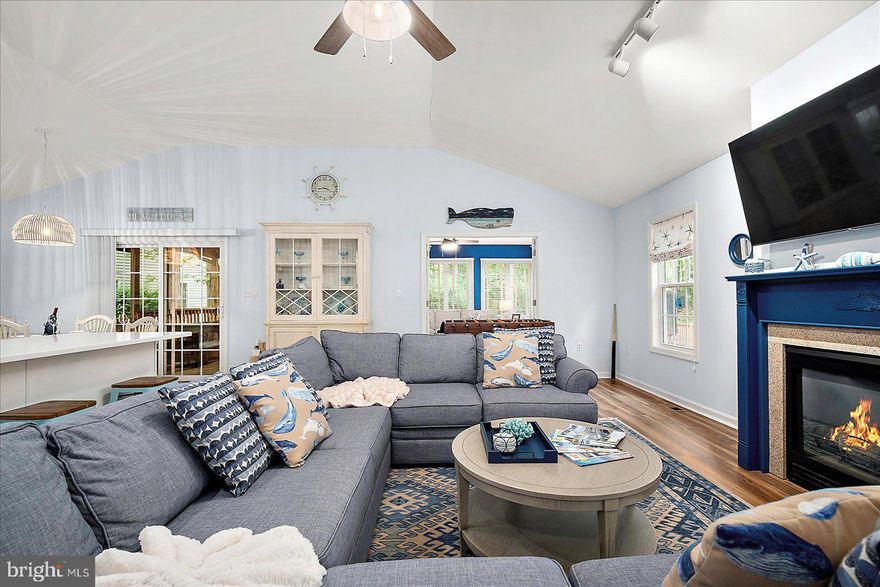 THIS ONE WILL WOW YOU!  Welcome to this beautiful, 3-bedroom, 2-bathroom home in tranquil Ocean Pines! With great curb-appeal, the front entrance offers a ramp, making for ease-of-access for all. Once inside, the LVP floors provide a walkway to show off the home, where upgrades lie throughout, from the full hall-bath serving the 2nd and 3rd bedrooms, to the large, primary bedroom and ensuite bath. On the other side of the house, the stately fireplace and living room flows seamlessly into the dining area and gourmet kitchen, complete with stainless-steel appliances and a breakfast bar on the other side. Also connected to the kitchen is the laundry room, with ample space and a large, stainless-steel sink. Past the living room is the spacious sun-room, with French doors that can section off to make for an additional living area or office. From there and the dining area, sliding-glass doors gain entry into the screened-in porch, ideal for a morning or evening beverage and listening to the sounds of nature, while being shielded from the elements. Located just beyond the porch, the grand backyard boasts myriad space to take the entertainment outside or for family fun, and with it being entirely fenced-in, it's ideal for children and pets.
And if all that weren't enough, the aforementioned Ocean Pines community offers loads of activities to become involved in, like tennis leagues, golf memberships, pool access, and socializing at the Yacht and Beach Clubs!
Don't hesitate on this fantastic opportunity to own this beautiful home in a lovely community!
Furnishings negotiable outside the sale of the home.
Inspections and appraisal have been completed.  See list of upgrades and ages under documents. Submit your offer today for this beautifully updated home.