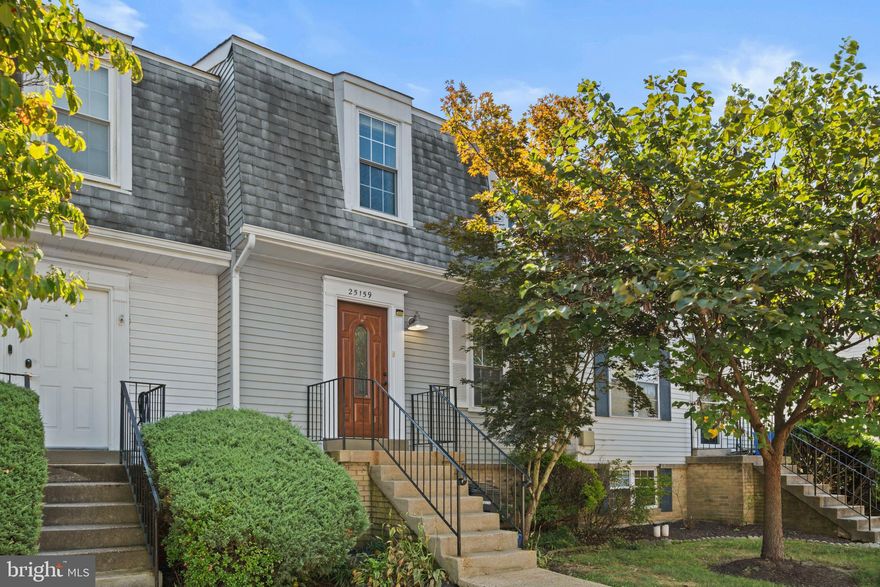 ***$15,000 PRICE REDUCTION*** Turn-key, 2-level Condo/Townhome Living (NOTE: There is another Condo below this unit) -- Move right in to this freshly painted, townhome-style 2-level condo with hardwoods throughout, gas utilities, and a fantastic $178/month condo fee that keeps ownership easy. The main level features a bright living/dining area with crown molding, a mirrored accent wall, and French doors to a freshly painted deck with stairs to the lawn and open common space. A convenient half bath, under-stair storage closet, and foyer laundry (stacked W/D  5 yrs) add everyday practicality. The updated kitchen offers gas cooking & heat, painted cabinetry, ceramic-tile flooring, dishwasher. Upstairs, the spacious primary bedroom showcases dentil-style crown molding, a ceiling fan, hardwoods, and both a standard closet plus a large armoire that conveys. Two additional bedrooms, both with hardwoods and decorative trim, share a updated hall full bath with tiled tub/shower and mirrored medicine cabinet. Need extra storage? You’ll love the pull-down attic access in addition to the main-level closet. Recent essentials include a 40-gal water heater ( 3 yrs). The condo association covers the roof, siding, walkways, porch, and yard maintenance—helping keep costs predictable while you enjoy the space. Easy, low-maintenance living with room to spread out—exactly what you’ve been looking for. “MORTGAGE SAVINGS MAY BE AVAILABLE FOR BUYERS OF THIS LISTING. ”