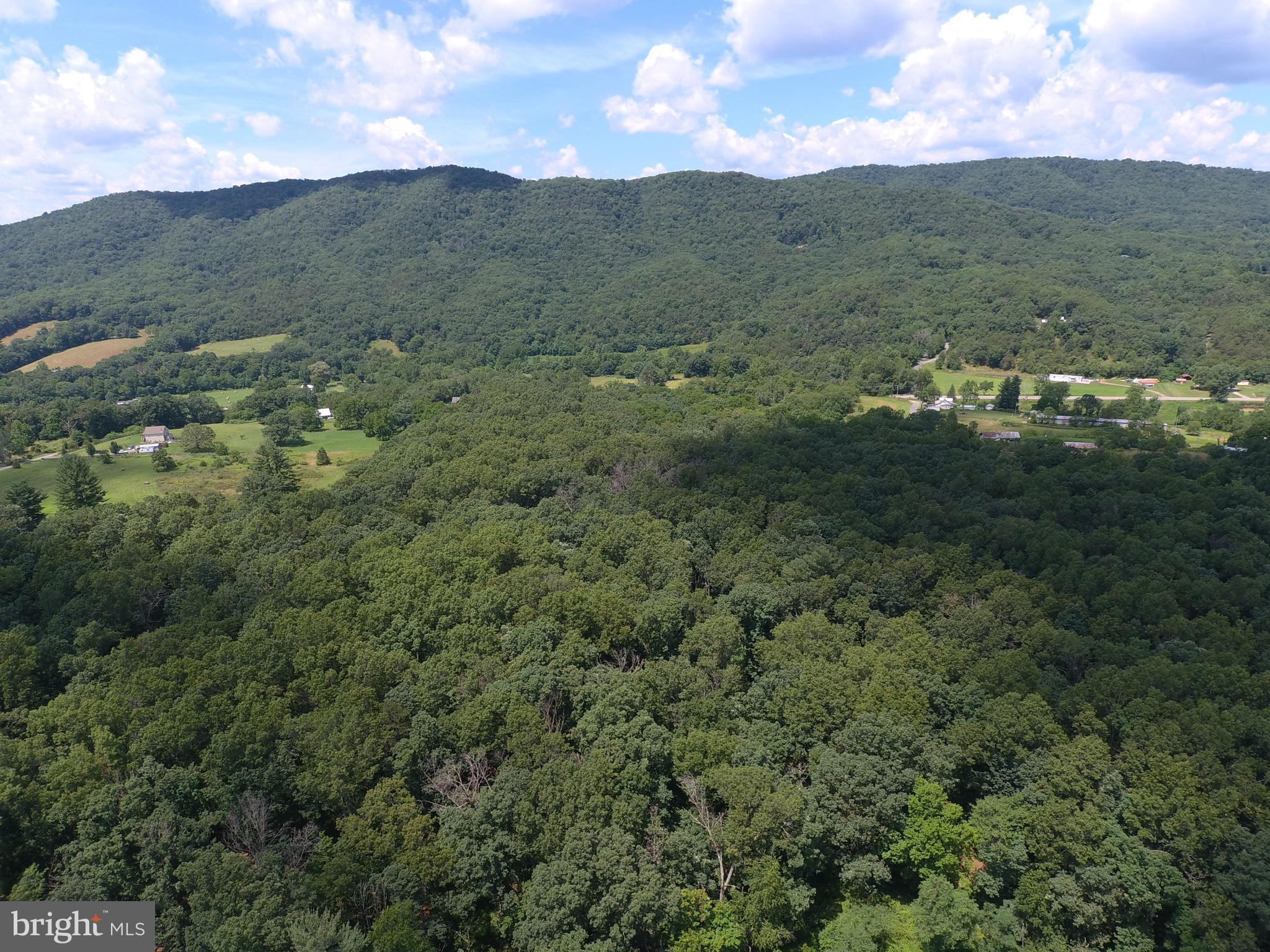 NONE UNRESTRICTED - Land