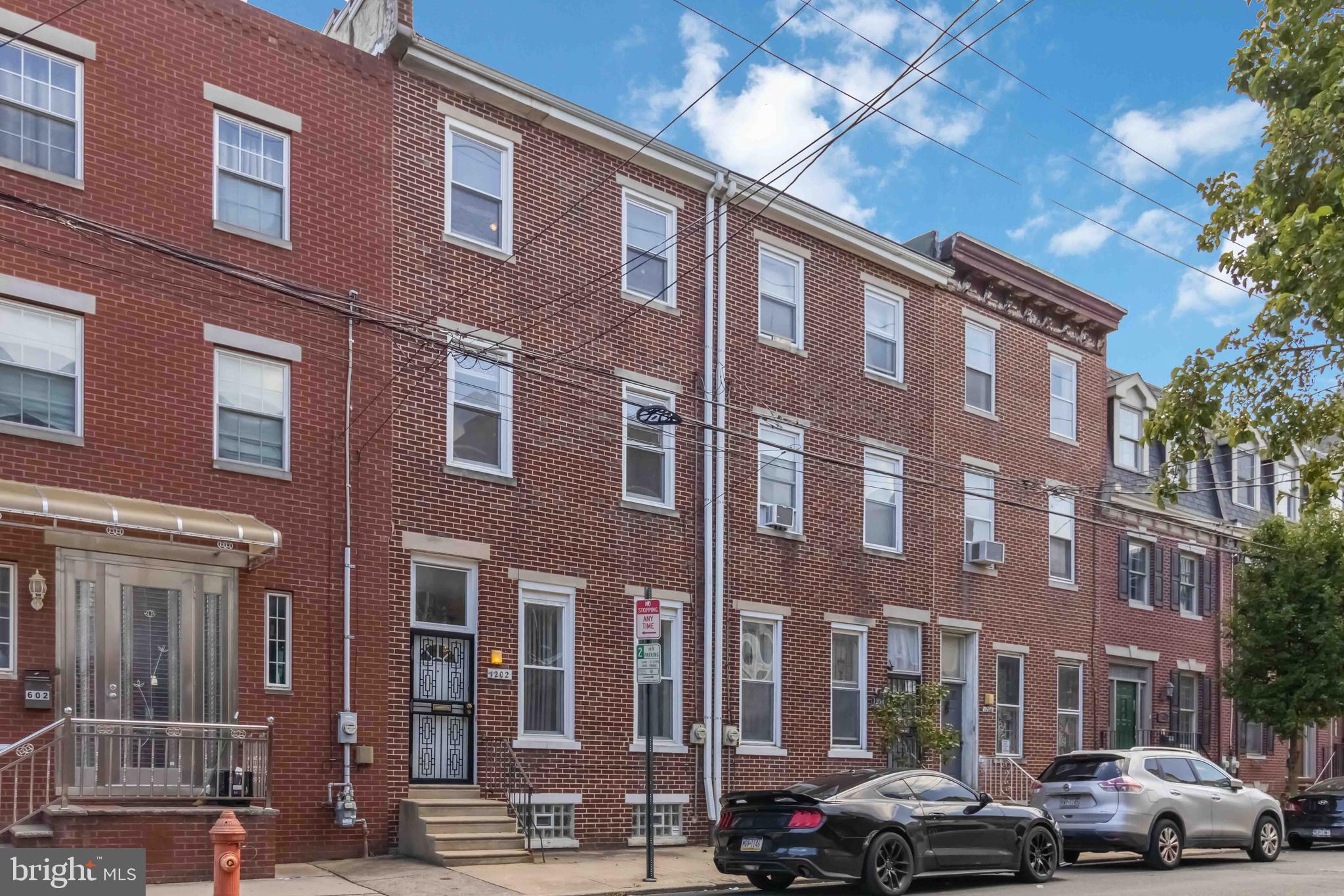 Welcome to 1202 Mount Vernon Street, a rare Philadelphia gem offering the perfect mix of modern updates, city convenience, and the hard-to-find bonus of off-street parking for up to two cars.
Step inside to discover fresh touches throughout. This 4-bedroom home has been recently painted, creating a bright, welcoming atmosphere. Hardwood flooring flows through the living room, dining room, and stairways. The kitchen features brand new porcelain flooring, an updated ceiling with recessed lighting, and plenty of space to cook, gather, and entertain. A convenient first-floor half bath adds practicality for daily living. All four bedrooms and the dining room have been updated with new lighting and ceiling fans. Each bedroom includes a walk-in closet with recessed lighting. New flooring extends throughout all bedrooms and hallways. The clean, unfinished basement is ideal for storage or future customization.
Upstairs, the home continues with comfortable living spaces ready for your personal touch. With its thoughtful updates, functional layout, private patio, and rear parking, this property is move-in ready while still offering opportunities to make it your own.
Beyond the home itself, the location is a standout. Nestled in a historic and lively neighborhood, you’ll find popular restaurants, cafés, and entertainment spots just a short stroll away. Center City, the Art Museum, and the Avenue of the Arts are all within easy reach. Transportation is seamless, with quick access to Broad Street, I-76, I-95, and multiple SEPTA lines.
Nearby schools, universities, and green spaces—including Franklin Square and neighborhood parks—add to the convenience and appeal of this address.
1202 Mount Vernon Street offers a combination of location, updates, and the rare comfort of private parking—your gateway to enjoying the best of city living.