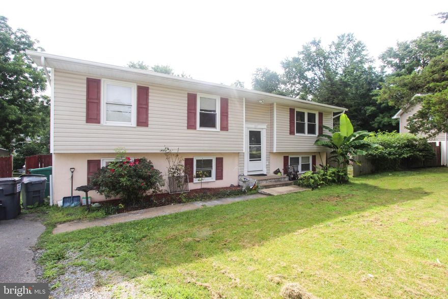 Spacious home on a nice lot. Home is situated on a quiet cul-de-sac with low traffic. Home has a spacious desirable layout with three bedrooms, two full baths on top floor, living room, dining room, kitchen and walk out to the deck. Lower level has one bedroom, full bath, and a large family room. The primary bedroom is on the main level with its own private bathroom. Large yard! No HOA fees!