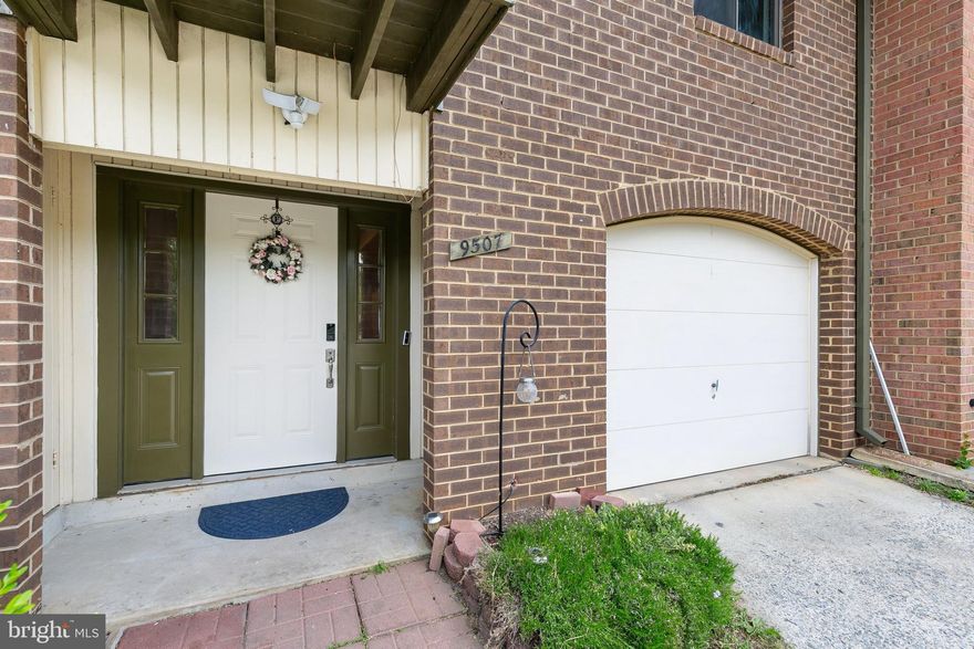 Spacious and full of flexible living space, this 3-bedroom, 2.5-bath garage townhome in amenity-rich Montgomery Village offers great indoor-outdoor flow and room to spread out. The entry level features a welcoming foyer with coat/storage closet, garage access, and a separate bonus room with laundry—perfect for a guest space, home office, gym, playroom, or movie nights.

The main living level features a sunny updated eat-in kitchen with pantry and balcony access, a convenient half bath, separate dining room, and a spacious living room filled with natural light. Sliding doors off the dining room lead to a composite wood deck with stairs down to the fenced patio and landscaped backyard, creating the perfect setup for entertaining or relaxing outdoors.

Upstairs, the spacious primary suite features a dressing area with an extended vanity and sink, closet, and linen closet, with the shower and toilet set separately for added functionality and privacy. Two additional bright bedrooms and a chicly renovated hall bath complete the upper level.

Additional highlights include a brand-new HVAC system (2026), Smart Home System, electric car charger, one-car garage, two-car driveway parking, additional parking directly out front, and a 2-year-old washing machine. The entry-level bonus room has a rough-in to add a bathroom. Enjoy all that Montgomery Village has to offer, including pools, tennis courts, walking paths, parks, lakes, shopping, dining, and convenient access to major commuter routes.