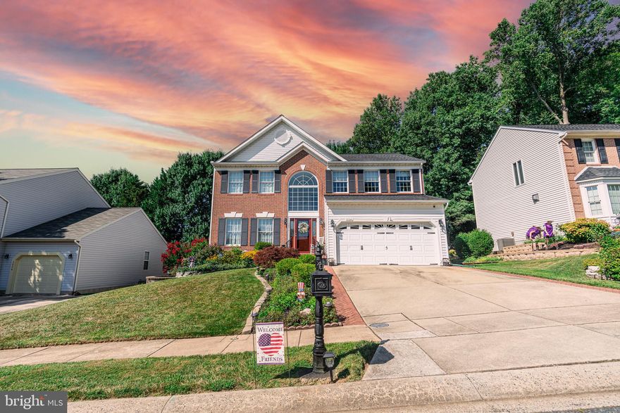 Welcome to this stunning, well maintained,  brick front colonial in Constant Friendship! The freshly painted main level boasts a 2 story foyer, hardwood floors, and lots of natural light! The kitchen features upgraded appliances, including an induction stove and convection oven, granite countertops and tiled floors.  The family room is complete with cathedral ceilings and a gas fireplace! Upstairs, in the primary bedroom you will find an oversized, walk-in closet and an en suite bathroom. The upgraded primary bathroom has granite top vanities, ample storage space and a beautiful tile and granite shower. The second level also features fresh paint, new carpet, and an additional walk-in closet in the guest bedroom. The finished lower level has lots of space to be used at your leisure, including a family room, playroom, work room and bonus room! There is also a rough in for an additional bathroom. Out back you will find a beautifully landscaped yard, with an oversized deck and gazebo for plenty of outdoor entertainment space! Don't miss this beauty, schedule your showing today!