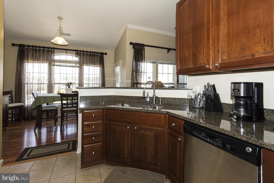 HEARTHSTONE AT VILLAGE CREST CONDOMINIUMS - Residential