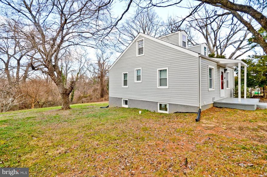 This Gorgeous 3 LEVEL Renovated 4 BR  is WAITING ON YOU! Nothing to do but MOVE IN. Step into lovely living room with brick FP, gleaming wood flooring, recess lighting, eat-in new kitchen,  full bath, 2 bedrooms on main level, loft/room upstairs, bedroom,full bath & partially finished basement, and huge yard. Near  bus line  & Metro. PETS ACCEPTED.   FRESHLY PAINTED (GRAY WITH WHITE TRIM}.....EASY RENTAL APPLY ONLINE. 600+ CREDIT  SCORE REQUIRED.