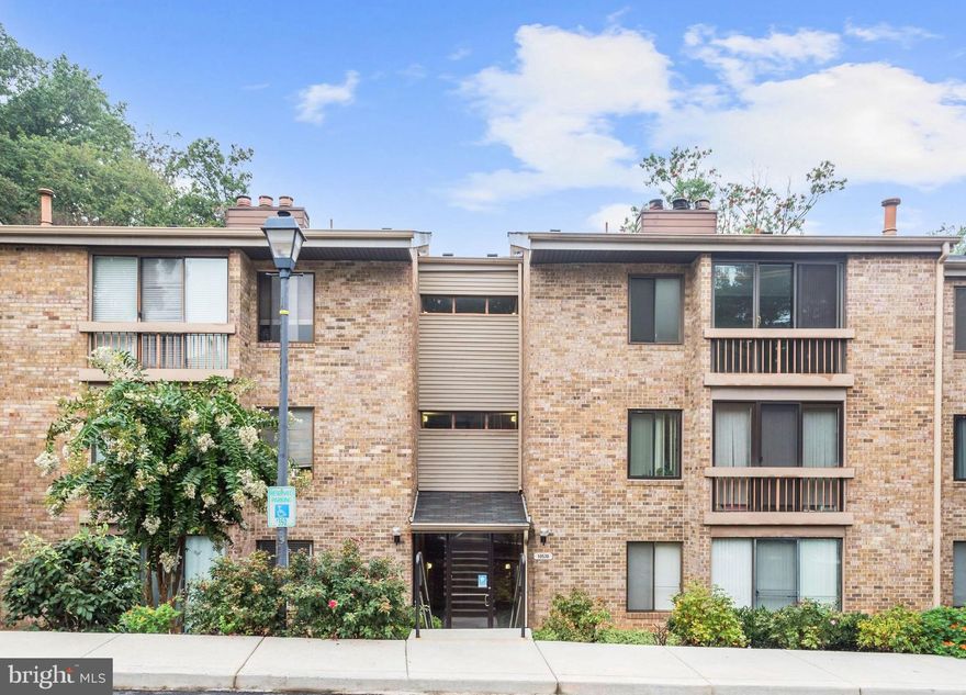 Enjoy one level living in this spacious condominium located in Columbia’s Village of Harper’s Choice community.  Enter into a freshly painted, bright and airy open floor plan that includes a dining area and living room highlighting beautiful hardwood floors, a decorative accent wall, and a cozy wood burning fireplace set in an elegant black stone surround, and offers sliding door access to the enclosed porch.  The kitchen features granite counters, white cabinetry, and stainless appliances including a built-in microwave, and gas range.  Brand new carpet in both bedrooms, and a large walk-in closet in the primary bedroom.  A full bath, and adjoined powder room provide dual entry to the shower. Columbia offers a vast variety of shopping, dining, and entertainment options at nearby Wilde Lake Village Center, Merriweather Post Pavilion, and The Mall in Columbia, with endless hiking trails, bike paths, and sports courts for outdoor recreation.  Commuter routes MD-32, US-29, MD-175, and MD-108 offer easy access to Ellicott City, Laurel, Fulton, and Clarksville.  This fantastic home won’t last!