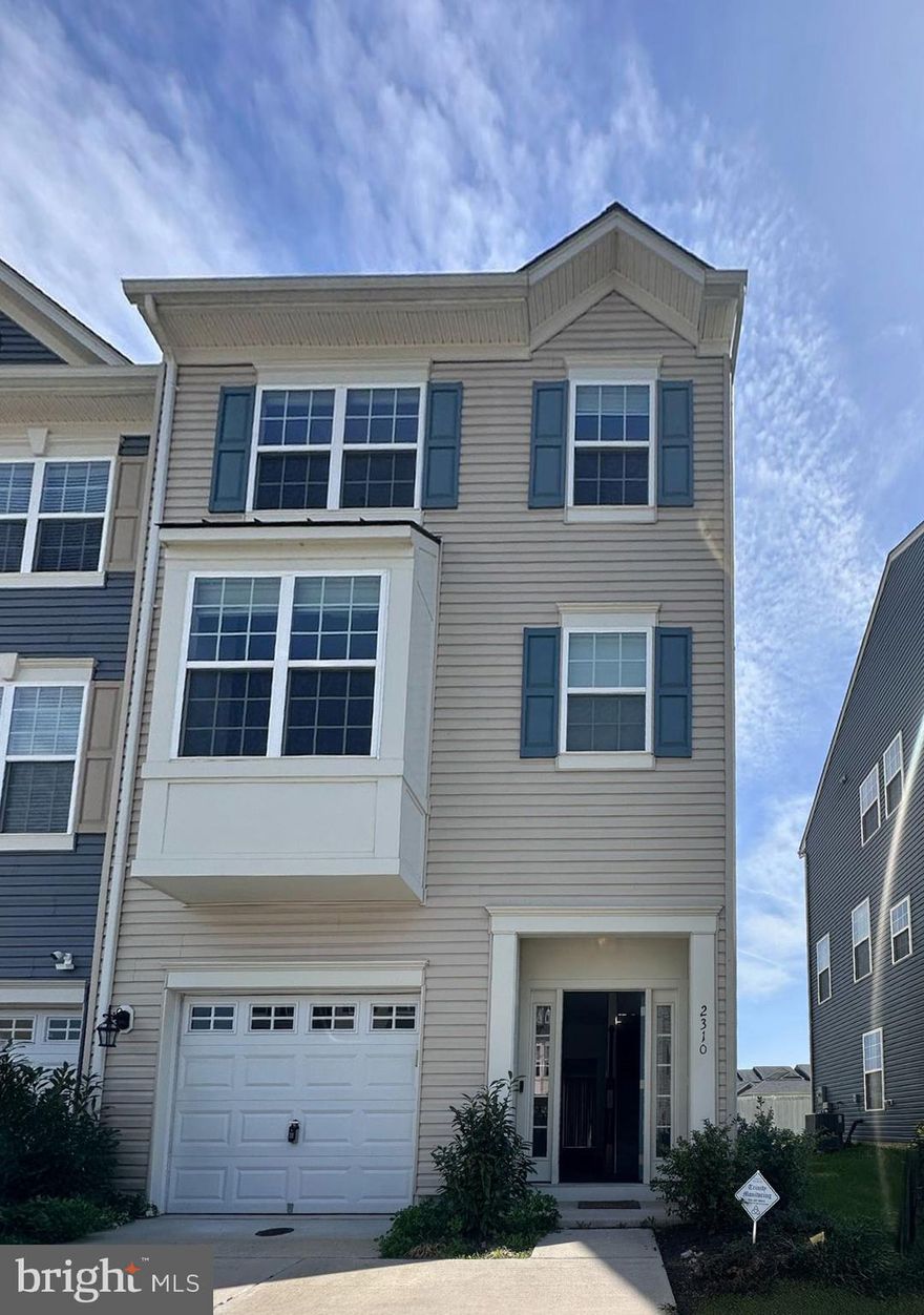 Welcome to your stunning three-level townhouse in New Post, Fredericksburg's newest planned
neighborhood. This home features a garage with additional overhead storage and a versatile lower level
boasting a full bathroom and bedroom, perfect for use as a second recreation room. On the main level,
enjoy wide plank LV flooring throughout the open concept living area. The gourmet kitchen is a highlight
with its sleek double oven, stainless steel appliances, white cabinets, pendant lights, and quartz
countertops. The island provides seating for three, and there's a spacious dining area flooded with natural
and recessed lighting. The family room offers ample space for entertainment, complete with large windows and access to a maintenance-free deck. Upstairs, the bedroom level features two secondary bedrooms with overhead lighting, sharing a hall bath. A separate laundry room adds convenience with storage space for baskets. The primary bedroom boasts a large walk-in closet and an in suite bathroom with an oversized shower, double sink vanity and water closet. This townhouse offers modern living at its finest, combining comfort, style, and community amenities right at your doorstep. Come! See! Live!