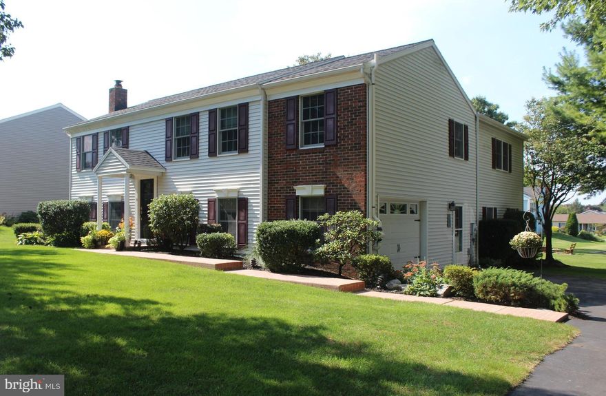 Definitely not your average bi-level! This home, with a two story addition,  offers 2600 sq feet of living space! The beautiful brick walkway and open entrance welcomes you to your visit. Nestled in Willow Acres, a Conestoga Valley school district neighborhood, you’ll find this location to be super convenient. Upper level boasts of a spacious kitchen and dining area with breakfast bar and stainless steel appliances. This area opens to a bright and cheery living room. Down the hall discover 4 bedrooms including a primary bedroom and bath accented with a cathedral ceiling, exposed beams, walk in closet and skylights. This space would be a welcoming retreat with your own entrance to the deck for morning coffee. The lower level will not disappoint! Super-sized family room with brick gas fireplace, dining area and full bath- this space leads to a lower level patio. The addition level below has added useful space including a large office along with two additional rooms. These spaces could serve well as additional bedrooms or in-law quarters having its own entrance. Venture outdoors to the deck perfect for entertaining overlooking a large yard waiting for play. Extra honorable mentions, new windows, security system, Google nest thermostat, UV treatment system, water softener, radon system and plenty of storage.