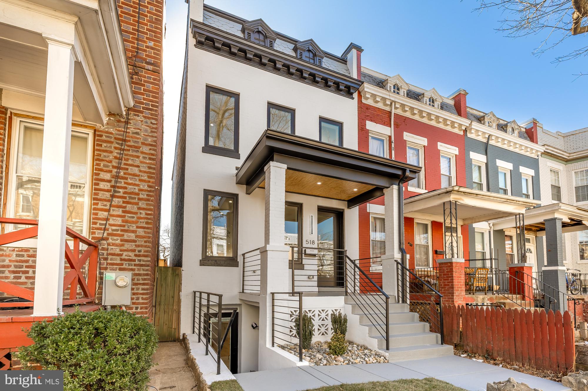 Welcome to 518 Kenyon St NW, Washington, DC.
Discover the epitome of urban luxury at 518 Kenyon Street NW, a meticulously designed residence where elegance and functionality converge. Nestled in the vibrant Columbia Heights neighborhood of Washington, DC, this stunning home offers 5 bedrooms, 3.5 baths, and over 3,000 square feet of thoughtfully curated living space, making it an extraordinary retreat in the city.
This home is a true masterpiece of modern luxury. The expansive primary suite is a retreat in itself, featuring a cozy fireplace, a private wet bar, and a spa-inspired bathroom complete with a soaking tub, a separate standing shower, and designer finishes. The residence also boasts two fireplaces, adding warmth and charm to the spacious living areas. The gourmet kitchen is designed to inspire, outfitted with state-of-the-art Bosch appliances, a double wall oven, and sleek, contemporary finishes. Perfectly tailored for entertaining, the home includes a wet bar in the primary suite and thoughtfully designed spaces throughout for gatherings.
Step outside and experience outdoor living at its finest. A 972-square-foot rooftop deck offers panoramic views, ideal for entertaining or unwinding. The deck and patio, complete with a stylish pergola, create a serene setting for al fresco dining and relaxation. The property also features private, secure parking with a two-car roll-up door for convenience and peace of mind.
Located in the heart of Columbia Heights, this home is surrounded by an array of amenities. Just blocks away, Columbia Heights offers a vibrant mix of dining and shopping options, including local favorites like Thip Khao, Mi Casita Bakery & Deli, and Creole on 14th, along with everyday conveniences like Target and Giant Grocery. For recreation, enjoy easy access to Rock Creek Park, Bruce Monroe Park, and the Smithsonian National Zoo. The nearby U Street Corridor provides a rich cultural scene, complete with music venues, theaters, and historic landmarks. With Columbia Heights Metro Station less than half a mile away and multiple bus stops just steps from the property, transportation is effortless.
This is more than a home—it’s a lifestyle. With luxurious features, expansive outdoor spaces, and an unbeatable location, this property truly has it all. Schedule your private tour today and experience the lifestyle you’ve been dreaming of. Welcome home!
