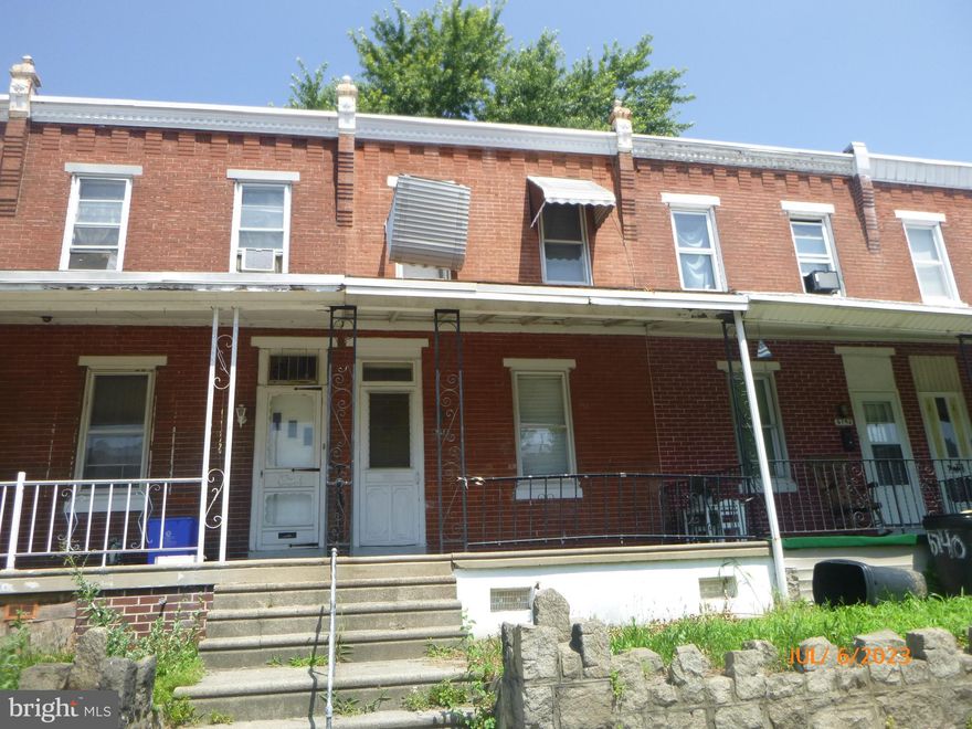 Great investment opportunity!  This 2 bedroom, 1 bath row (980 sf) has great potential at this price... Property includes an open porch and rear yard.  Needs repair but priced to sell fast. Convenient location.