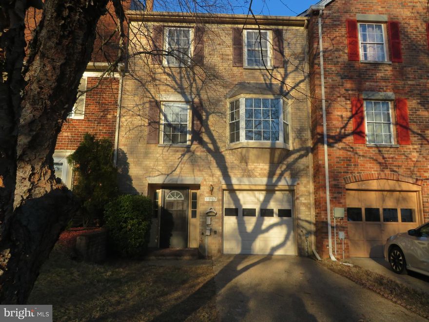 Spacious brick front 3 level garage townhome in the  sought after Woodstream East Community ... Features Walkout lower level with rec room and 1 car garage.  Upper level 1 features large living room with fireplace, separate dining area, half bath and kitchen.  Upper level 2 features 3 bedrooms and 2 baths.  New Carrier  HVAC heat pump 2024 and New GAF  Timberline Architectural  Shingle installed in 2024..Located minutes from NASA and I-495/I-95.   Seller doing a 1031 tax deferred exchange.