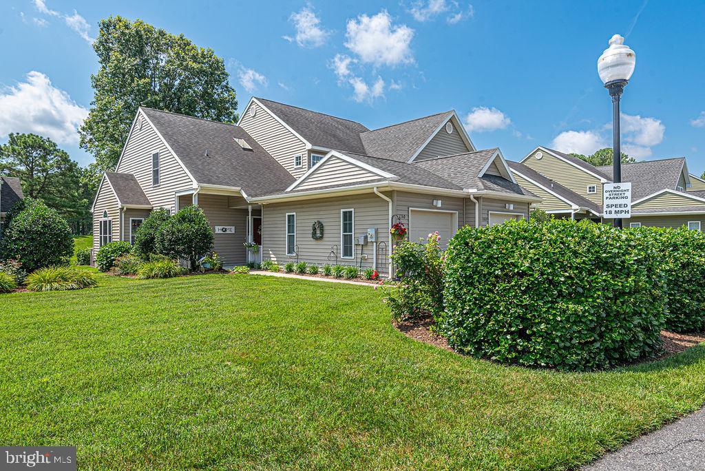Welcome to River Run, an amenity-rich golf course community nestled along the Shingle Landing Prong in Berlin, Maryland—just minutes from Ocean City! This spacious 4-bedroom, 3-bath townhome features a detached 1-car garage and a rare oversized second-story loft, ideal for guests, a home office, or recreation space. Inside, enjoy a bright, open layout with plenty of natural light, generously sized bedrooms, and thoughtfully designed living areas perfect for entertaining or relaxing after a day on the green. Located in a community designed around the scenic Gary Player Signature Golf Course, River Run offers resort-style amenities including an outdoor pool, tennis courts, putting green, pro shop, and an on-site restaurant beloved for its must-try Tutti Gusti pasta. For boating enthusiasts, the community marina offers easy access to the Saint Martin River and beyond—cruise by boat to Ocean City and enjoy waterfront dining, crabbing, or a day on the bay. Whether you’re seeking a coastal primary residence, vacation retreat, or investment opportunity, this home offers the best of both leisure and location. Don’t miss your chance to invest in the Eastern Shore lifestyle!
