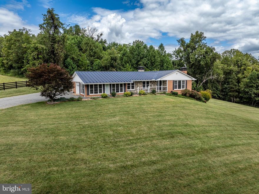 Back Available- buyer's financing fell through. Stunning luxury residence in the heart of the Town of Orange featuring three spacious bedrooms, three full baths, and two half baths. This meticulously remodeled home showcases numerous high-end upgrades, including Brazilian hardwood flooring and custom faux finishes. The gourmet kitchen is equipped with premium appliances, granite countertops, and a large center island—ideal for entertaining. The expansive primary suite offers a spa-inspired travertine shower and generous walk-in cedar closets. Additional features include a formal dining area, cozy family room with fireplace, and a beautifully landscaped yard with patio space perfect for outdoor gatherings. Attached one-car garage and ample storage throughout. Conveniently located near local shops, dining, and wineries. A rare opportunity to own a turnkey luxury home.