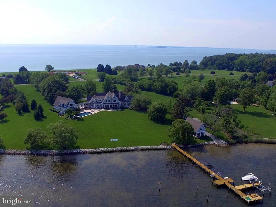 Welcome to Maryland's Eastern Shore. Custom designed home by Hammond Wilson Architects & Pyramid Builders. This breathtaking 6 acre lot nestled along a peninsula on the Wye River provides the perfect location.  Master suite on  main level, 3 more suites, extra bedroom, gourmet kitchen. Guest House, Boat house,pool, deep water private pier on the Wye and  more. Call for private tour.