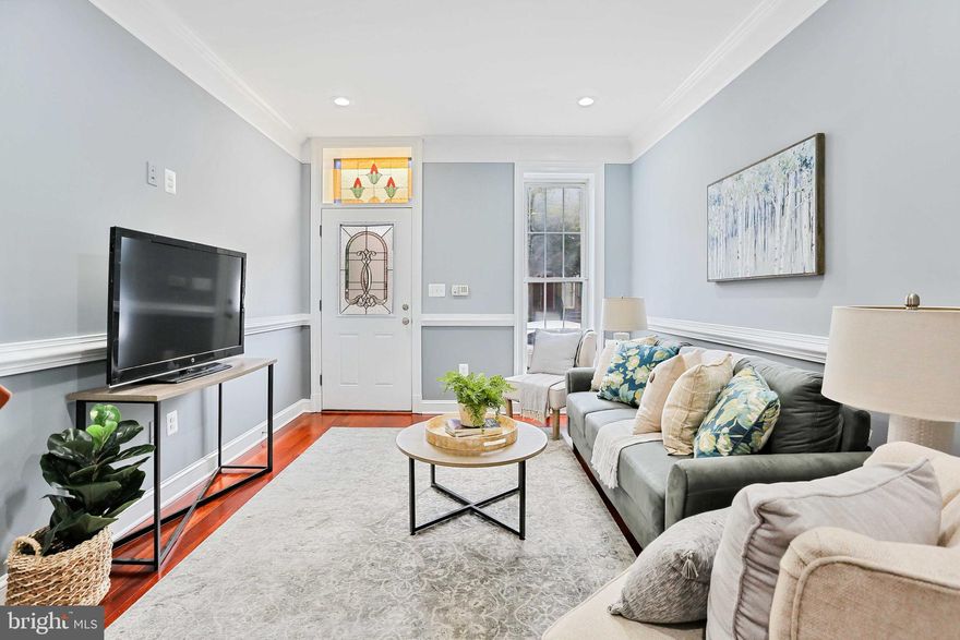 IMMACULATE FOUR-STORY NEWLY RENOVATED HOME IN THE HEART OF FEDERAL HILL NOW AVAILABLE. OVERSIZED RESIDENCE WITH 4 ABOVE GRADE BEDROOMS. FINISHED LOWER LEVEL WHICH INCLUDES THE 5TH BEDROOM. EASY TO ACCESS OFF-STREET DEEDED PARKING PAD. GLISTENING BRAZILIAN CHERRY HARDWOODS CASCADE THROUGHOUT THE ENTIRE HOME. ENJOY CUSTOM CREAM CABINETRY, UPGRADED TRIM AND PAINT PACKAGE, IMPORTED TILE, GRANITE COUNTERTOPS, SS APPLIANCE PACKAGE IN CHEF'S KITCHEN WITH LARGE PANTRY AND DINING SPACE. LOADS OF NATURAL LIGHT. HIGH CEILINGS. TONS OF STORAGE. WALK-IN SHOWERS. WALK-IN CLOSETS. VIDEO SURVEILLANCE. SPACIOUS 5 BEDROOMS WITH 3 FULL BATHROOMS AND 3 HALF BATHROOMS. 4TH LEVEL INCLUDES EXPANSIVE ROOF DECK WITH STUNNING CITY VIEWS AND WET BAR - GREAT FOR ENTERTAINING. CLOSE PROXIMITY TO RETAIL SHOPPING, LOCAL DINING, AND ALL MAJOR HIGHWAYS. SCHEDULE A PRIVATE TOUR TODAY.