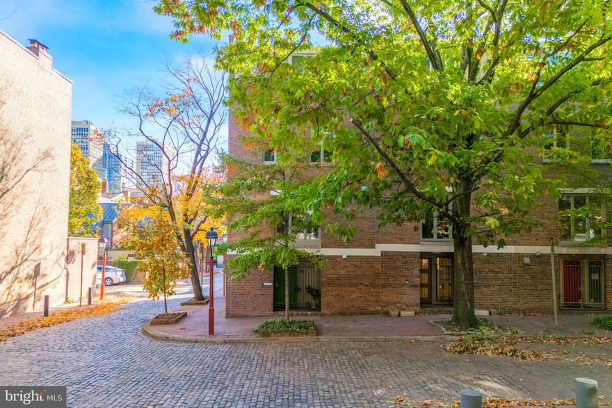 315 Lawrence Court, a stunning modern residence is being offered for sale for the first time in 40 years. Lawrence Court is a quiet cobblestone street lined with trees and design by architects Bower & Fradley in 1970.  Enjoy lush views from the oversized windows that bring natural light from all 3 directions in this corner residence. As you enter, you are greeted by an open and inviting floor plan that seamlessly connects all the living spaces. The entry level has a den with a gas fireplace, a mechanical room, half bath, and another room that was used as an office space but could also be a home gym, playroom, or bedroom. The next level has the dramatic living room with 10 ft+ high ceilings, a wood burning fireplace with built ins on either side and french doors overlooking the rear patio. The abutting dining and kitchen area up a few stairs makes for easy entertaining.  Some highlights of the kitchen are a Subzero refrigerator, a Wolf stove, Poggenpohl cabinetry, and a Quartz countertop perfect for the culinary enthusiasts. On the next floor there are 2 bedrooms, with one having an ensuite bathroom with a stall shower and a walk in closet, and the other originally 2 bedrooms, now 1 spacious bedroom and a hall full bath with a tub. One the third floor there is the primary bedroom with built ins and an ensuite bathroom with a walk in shower and a large vanity with double sinks. Finally, there is another bedroom on this floor as well. Outside, the patio is perfect for relaxing or hosting gatherings and has access to the parking spot behind the home. There is a transferable 15 year warranty on the brand new roof as well and many newer Anderson windows.  Finest location in a historically preserved neighborhood, with enchanting green spaces such as Three Bears Park, Independence Park, and the upcoming 11.5 acre park with the 95 capping project, while being a quick walk away from a myriad of fantastic restaurants, cafes, the Ritz and PFS theaters and only a 15 minute ride to the airport.