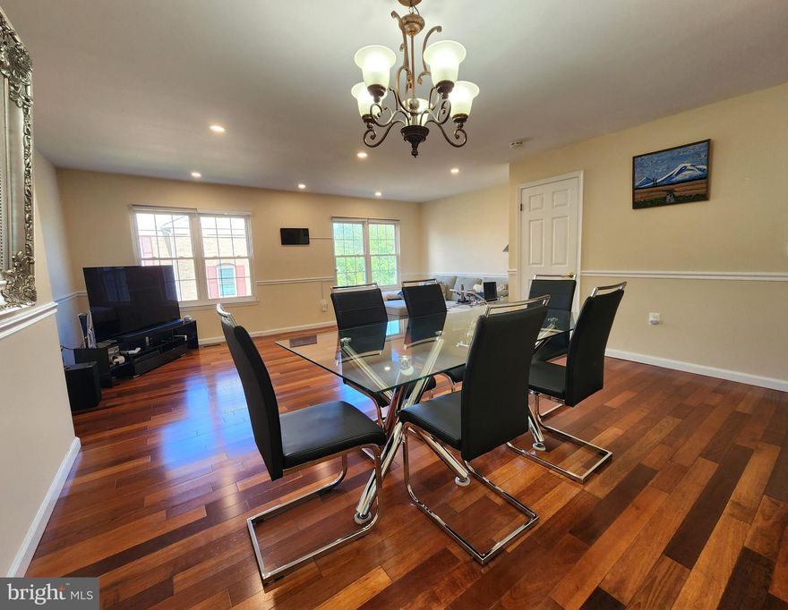 Welcome to this beautifully maintained 4-bedroom, 3.5-bathroom townhouse offering a perfect blend of modern convenience and cozy charm. Spread across three spacious levels, this home features gleaming wood floors throughout—no carpet anywhere! The main level boasts a bright and airy living room, a generous dining area, and an updated kitchen complete with wood cabinets and newer stainless steel appliances. Upstairs, you'll find three well-sized bedrooms, including a primary suite with an en-suite bath, plus an additional full bathroom for the other two rooms. Ample storage throughout makes organization a breeze. The walk-out lower level is an entertainer's dream, offering an expansive family room with windows, a cozy fireplace, and direct access to the fully fenced backyard. The separate 4th bedroom, complete with its own closet and window, is ideal for guests or a private home office. There’s also a dedicated laundry area with extra storage. The Amberfield community provides premium amenities such as a community pool and tennis courts, a playground for kids, well-maintained common areas, and ample parking for you and your guests. Short distance to local shopping, Rio Washingtonian Center, Downtown Crown, Kentlands, Shady Grove Hospital, and easy access to I-270. Pets are welcome on a case-by-case basis. Don’t miss your chance to rent this move-in-ready townhouse in a great location—schedule your viewing today!