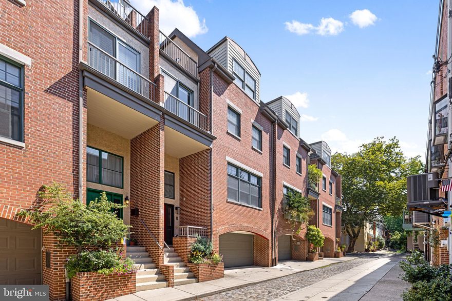 Beautiful sun drenched and southern exposed 28' wide townhouse on an amazingly located and quiet block in Fitler Square!  A perfect blend of privacy and city accessibility. Offering 4 bedrooms, 2.5 baths, 3 decks, a patio, plus a full 2 CAR GARAGE!  The stunning main floor is an incredible space for entertaining! The open floor plan has 10' ceilings, hardwood floors, a living room with gas fireplace, a huge kitchen with ample espresso cabinets and white quartz counter tops, GE Monogram stainless steel appliances, and a dining area with doors leading to a deck begging for dining al fresco on summer nights. The full width master bedroom suite consists of a sunny sitting (or workout) area, a deck,  large twin walk-in closets, and a stunning remodeled master bath with soaking tub. The top floor has 2 large bedrooms, deck, a full hall bath, an open study area with access to another deck. The lower level houses a half bath, garage access, family room with radiant floor heat, and the patio. Other amenities include 2 zone HVAC, 2 water heaters, 5 ceiling fans, intercom system, and heated foyer floors, and LOTS of storage.  Current owners have lovingly and continually updated this home room by room; making it absolutely move in ready for the new owners. Walk 500 feet to the Schuylkill River Park for a game of tennis, or to the entrance of the Schuylkill River Trail for a late night stroll up to the Art Museum.  City living at it absolute finest!