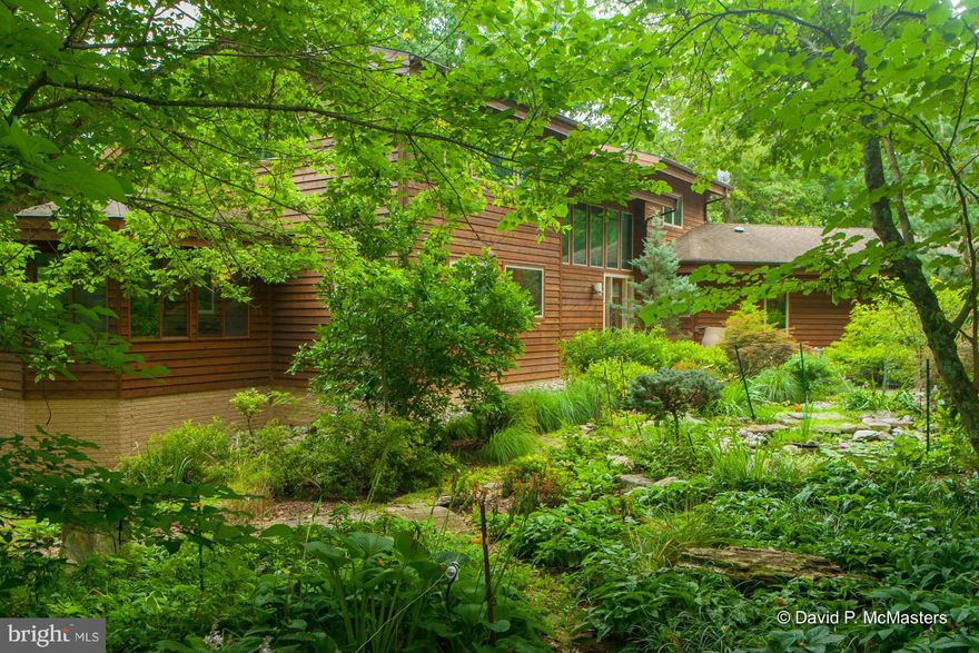 SPECTACULAR Lindal cedar Post + Beam home over the Potomac close to Shepherdstown. Great walls of windows w/ river + garden views everywhere. Big 1st floor Master Suite + another in fin bsmt. Wood floors, granite, great wood beams, Lib.,sun room. AMAZING gardens, paths fountain. PRIVATE.Gentle path to river. 300' waterfront. Big decks, 2C gar. Absolutely lovely in every way. 10 mins to MARC train.