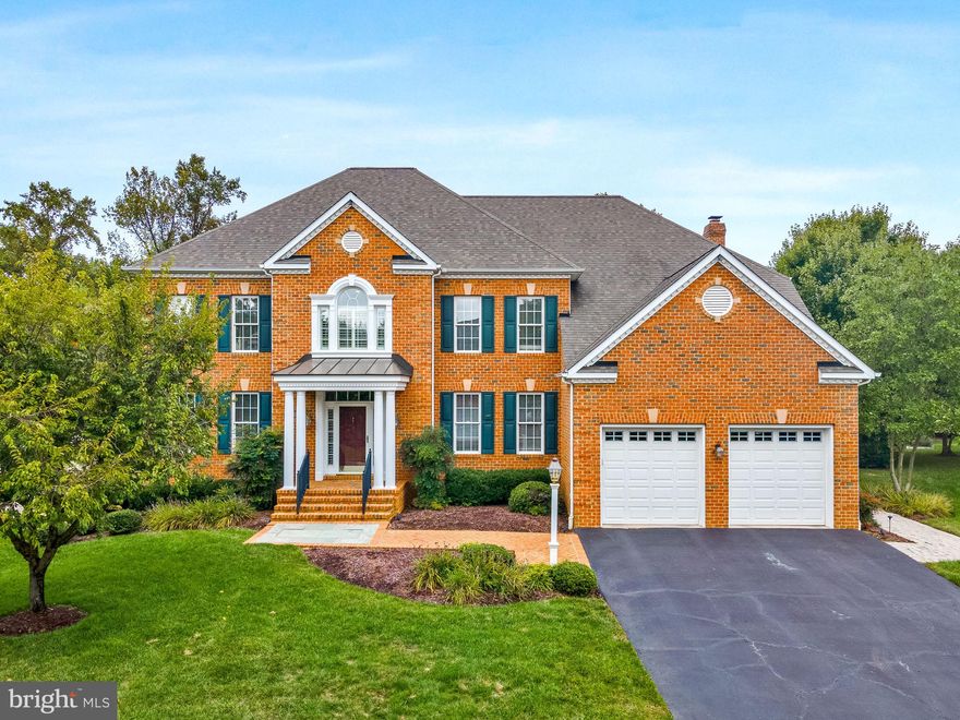 Welcome to 502 Tremont Circle nestled in Colonial Manor community in the heart of Broadneck Peninsula.  This gorgeous brick front colonial is turn key with the most amazing backyard oasis on the market!  Thoughtfully updated with designer finishes throughout, no detail has been overlooked. Entertain both inside and outside with the meticulously maintained lawn, fabulous salt water pool and paver patio that flow seamlessly into the main level billiard/game room and great room beyond. With over 6,300 sq ft of living space across 3 levels, there is space for everyone in the five bedroom, four full and one half bathroom home.  A grand two story foyer is flanked by private main level study or home office and formal. living and dining rooms flowing to the updated gourmet kitchen complete with casual dining space, large center island with seating, granite counters, white cabinetry and stainless steel appliances.  A sunken great room is outfitted with surround sound and has a gorgeous stack stone fireplace as a central focal point.  Travel up the back, second staircase to the bedroom level with a relaxing primary retreat.  This spacious suite offers a large bedroom with sitting area, dual walk in closets and private en suite super bathroom with soaking tub, glass enclosed tiled shower and double sink vanity. An additional suite with private bathroom and two bedrooms with a shared, full jack & jill bathroom complete the upper level.  A fully finished basement would be a wonderful in-law or au pair suite with a huge bedroom,  fourth full bathroom, a large rec room and great storage space. Hardwood flooring throughout the upper levels, Luxury LVP on the lower level, updated designer lighting & fresh neutral paint throughout.  3 zone HVAC, Andersen windows, lawn irrigation, whole house generator & SO MUCH MORE!  Blue Ribbon Schools, easy commuter access & a short drive to restaurants, shopping & entertainment. Schedule your private tour today!