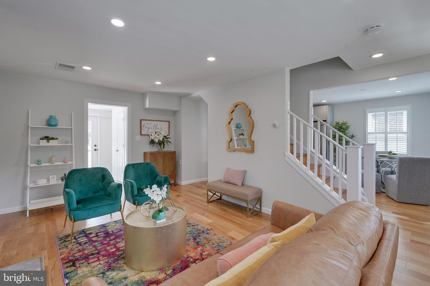 Simply gorgeous and meticulously maintained.   You will instantly feel at peace once you walk through the doors of this harmonious home located in Avondale.  Fall in love with the warmth of the living room with fireplace, hardwood floors, and adjacent sunroom and half bath.  Create gourmet meals in the well-thought-out kitchen with SS appliances, granite countertops, a breakfast bar, backsplash, and beautiful pendant lights. The upper level includes a beautiful primary suite and a spacious secondary bedroom with full hall bath.  The lower level includes an additional bedroom with a full bath and recreation room. A wet bar and the laundry area are also located on the lower level.   Enjoy outdoor entertaining on the quaint deck and patios or fenced-in, grassy backyard.  The sellers have further improved the property to include electrical panel upgrade, tree removal, installing sod, a fence, gutter guards, window treatments, and a garage door with opener.