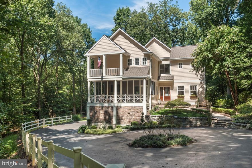 This property was just  reduced 50K  to sell with the owner having done 350k in recent improvements while  having had no intention of moving other than finding a waterview home he loved as much .. At this price it is an exceptional value in the Annapolis - St Margarets area. .  The location within the lovely Meadows community is minutes from downtown Annapolis, and yet this home offers true privacy within a wonderful robust  neighborhood.   Clearly remarkable and distinct this Craftsman Contemporary rests on private setting with beautiful landscaping and lighting. The unique setting is easily maintained and offers a park like sanctuary.  The Interior finishes showcase the home's  extraordinary  architectural nuances with curved walls, vaulted and beamed ceilings, and artistic ironwork staircase. The  handsome  master bedroom suite offers a new Spa bath and morning porch. There is 1  bedroom en-suite,and 2 additional guestrooms, a hall bath and powder room,, all  newly updated. The Chef's Kitchen with custom designed and hand built Cherry cabinets, includes  stainless top grade appliances, granite island and an eat in area in a  great gathering setting.  The kitchen also opens to a beautiful Southern style screened porch, perfect  for entertaining . A gracious large dining room with clearstory windows adjoins the cozy living room  with gas fireplace.  The living room  opens to  a multi-tiered IPE deck overlooking the stone patio, fire-pit, and private wooded and cleared acreage, terrific for kids and pets.  The  lower level recreation room is walk out level, sunny and bright. It is the perfect family room for Sunday game day retreats. The newly added state of the art home systems are Green, highly efficient and economical. The seller will convey select furniture with the property is buyers desire.  The lot can take a pool or extra extra garages over the 2.5 garages it now offers. It is a wonderful family or empty nester home  Truly a one of a kind unique property in the Broadneck School District.  The seller has a current appraisal and is motivated.