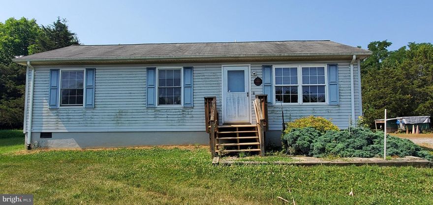 Opportunity Is Knocking!  Come make this home your own.  Property is being sold "as is" but offers loads of potential.  One level living on 5.02 acres zoned Agricultural.  Plenty of outdoor space and acres to roam.  Large outdoor shed with electric, perfect workshop or additional storage.   No HOA!  Great access to I-66 perfect for commuters.