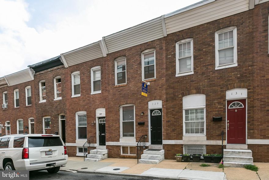 PARKING AND JUST 1 BLOCK TO PARK! Granite counter tops, stainless appliances, exposed brick, hardwood floors, crown molding, deep soaking whirlpool tub, great lower level storage and ALL at an affordable price AT LAST! See today!