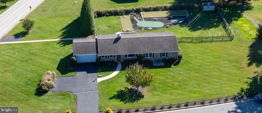 Exceptional Properties. Exceptional Clients. 

Peaceful County Living Meets Walkable HISTORIC Hampton Charm Welcome to the best of both worlds — a fully renovated ranch-style retreat offering peaceful county living with the walkable convenience of sought-after Hampton. Nestled on a quiet street and zoned for top-rated schools including Hampton Elementary, NDP, and several prestigious private institutions, this 4-bedroom, 3-bath gem delivers comfort, style, and functionality in equal measure. 

Step inside to a bright, open layout with refinished hardwood floors, a spacious living room centered around a stone fireplace, and elegant French doors that open to a newly built oversized deck — perfect for entertaining or simply enjoying your private backyard oasis. At the heart of the home lies a stunning designer kitchen, complete with a large island, quartz countertops, ceramic tile backsplash, and premium stainless steel appliances — all thoughtfully curated for the modern home chef. The expanded primary suite is a true retreat, featuring a spa-like en-suite bath with dual vanities, a custom-tiled, with glass tile ceiling, shower. This bath also has the convenience of an in-room laundry. Two additional main-level bedrooms offer flexibility for guests, office space, or a home gym — all enhanced by natural light, updated fixtures, and hardwood floors. 

Downstairs, the finished lower level spans over 60 feet and includes a second kitchen, a large bedroom with full bath, a massive walk-out family room, and generous storage. Whether you envision a home theater, game room, in-law suite, or playroom — this space adapts to your lifestyle. Step outside to your private, fully fenced backyard oasis featuring a bocce court, a putting green, dedicated corn hole court, and an oversized heated swim spa — all surrounded by mature trees and drenched in morning sunlight thanks to eastern exposure.

New Furnace!  

Take a short stroll down the street, and you will be at the Hampton Pool! This rare Hampton offering blends modern luxury with timeless charm in one of Baltimore County’s most desirable, walkable communities.