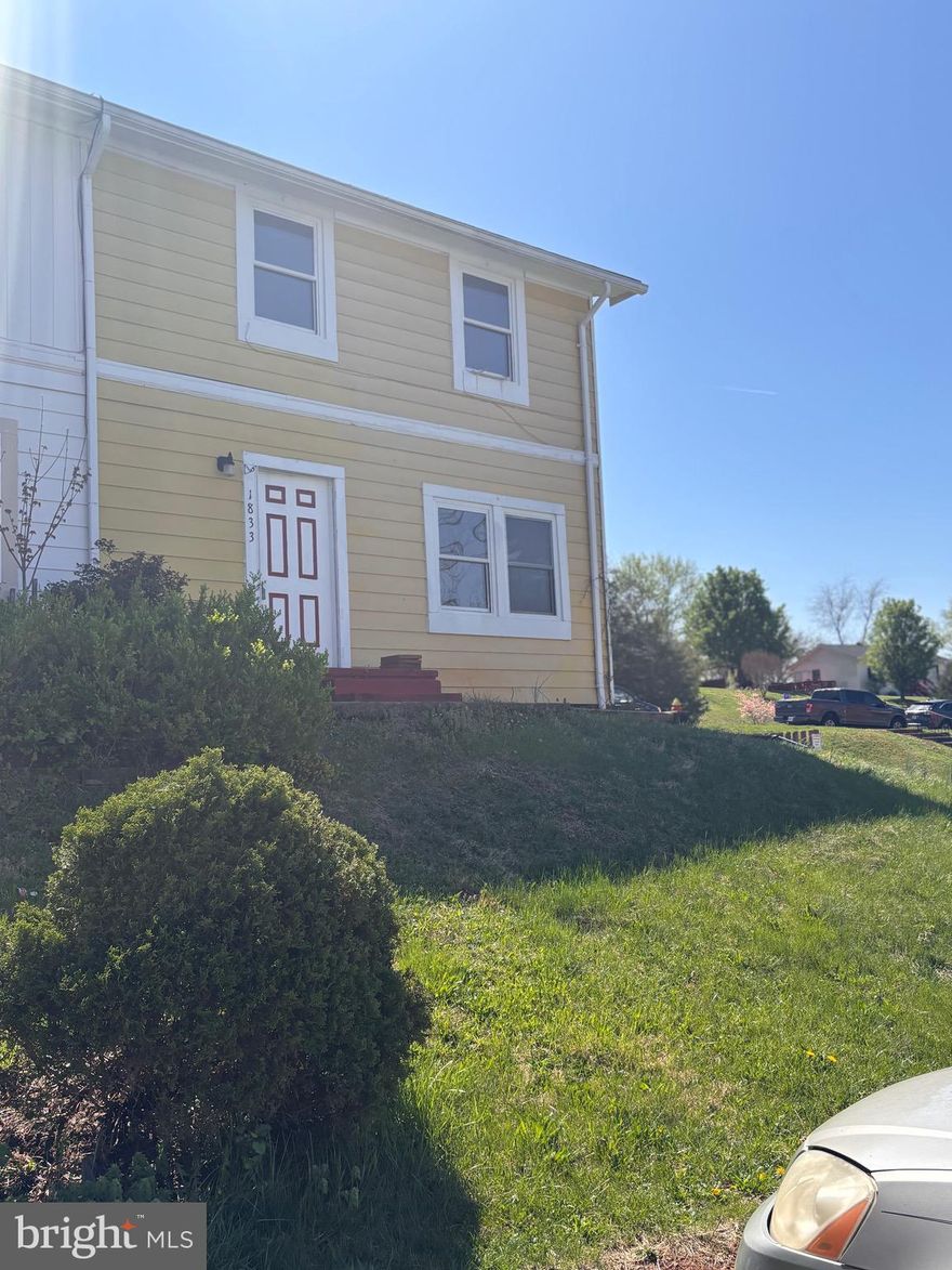 This two-story end-unit townhome is being sold as-is and offers incredible potential with just a bit of TLC. Featuring 3 bedrooms, 1.5 baths, and a spacious end-unit lot, this home is perfect for buyers looking to personalize and add value. A great opportunity to create your ideal living space or investment property."