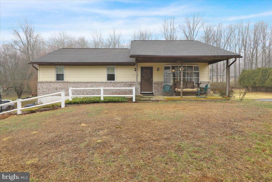 Situated in a quiet country setting just minutes from major highways is where you will find this 3 bedroom, 2 full bath ranch home just waiting for you to call it home.  Step inside to a spacious living room that leads to the kitchen with modern appliances and dining area that leads to the deck overlooking the serene backyard. The basement could be finished to provide additional living space and leads to a 2 car garage. The home could use your personal touch, but the roof and mechanicals are newer and the septic system was just pumped and inspected in December. This is an Estate and the property is being sold AS IS.