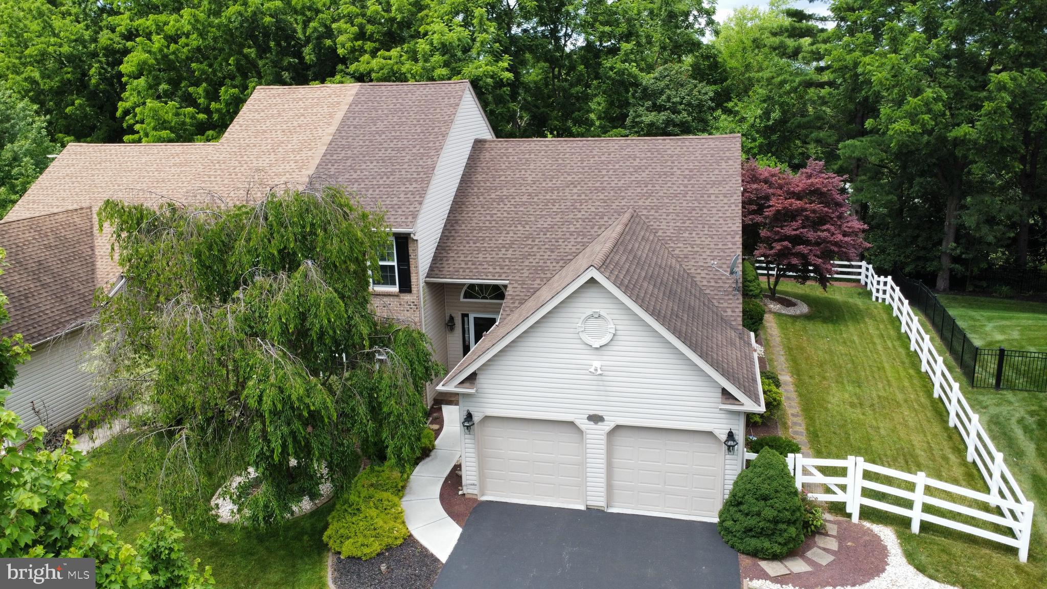 One floor living at its finest. Well maintained East Penn twin offers a first floor master suite with opulent bath and walk in closet. Spacious open floor plan features great room with soaring cathedral ceiling and gas fireplace plus formal dining room with upgraded trim package and refreshed eat in kitchen with granite counters, tile backsplash and recent stainless steel appliances. First floor laundry with custom cabinets and granite top prep area and 1/2 bath complete main level. Second floor would make great extended family situation with large loft, two bedrooms and a second full bath. Plenty of storage in full basement and two car garage with openers. Enjoy the outdoors on the 17x13 tile patio or on the surprisingly spacious fenced private yard. Home has low maintenance solid surface floors throughout except for one bedroom. Economical natural gas furnace and central air replaced 2021. All window treatments remain. Great location close to park, schools and shopping.