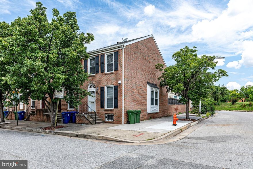 **  OFFER DEADLINE SATURDAY JULY 30TH, 5PM ** Welcome home.  Check out this spacious and light filled 3 bed, 2 bath, end-unit townhome . So many boast-able features!  Including, a spacious kitchen with a new stove, and hardwood flooring on the the main and 2nd level.  The primary bedroom has two large closets and access to the main full bath.  No need to worry about storage with two bonus closets and attic access  in the upstairs hall.  The lower level has new carpet throughout and includes the den/bonus room,  laundry room,  the 3rd bedroom, and 2nd full bath,.  This home has been freshly painted and sells with a new thermostat,  washer and dryer.  The back yard is great for entertaining, providing space & privacy.  This home includes one deeded parking space.  | Pigtown, also known as Washington Village, is a hip, historic community that neighbors the Inner Harbor, Camden Yards and M&T Bank Stadium. It's a short distance to University of MD Law, Medical and Business Schools. Pigtown's main street, along Washington Boulevard, offers a vibrant business community, local shops and great eats. Easy access to downtown, 95, 695, & MARC train station.