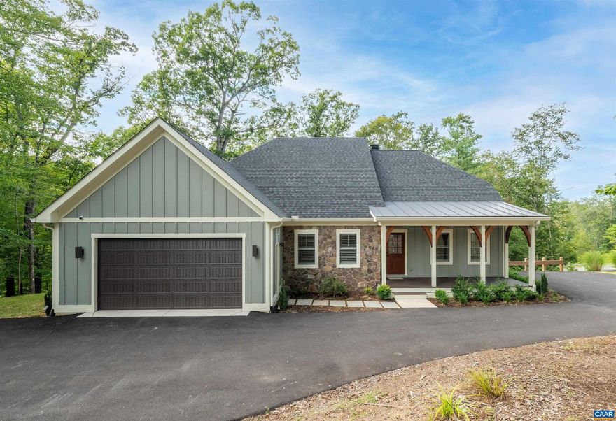 Come check out this 2023 European Homes masterpiece, a residence that perfectly balances sophistication, comfort, and convenience. Thoughtfully customized, this 5 bedroom, 4.5 bath, 4,600 sq. ft. home is nestled on 1.5 wooded acres?just minutes from UVA, Downtown Charlottesville, dining, and shopping?yet it feels like a private retreat.  This home features hardwood floors throughout the home, a chef?s kitchen with quartz countertops and stainless steel appliances, and an open-concept living area with a gas fireplace. Step onto the screened porch to enjoy serene wooded views or relax in the elegant primary suite featuring a spa-like bath with marble finishes.  The fully finished terrace level offers versatile living, complete with two additional rooms perfect for a home office, gym, or media space. Outdoor living is at its best with a custom stone outdoor gas fireplace, hot tub, and patio designed for relaxing and unwinding.  Built with exceptional quality and care by Massimo Rampini of European Homes, this residence exemplifies refined craftsmanship, blending timeless design with modern comforts.,Granite Counter,Fireplace in Family Room