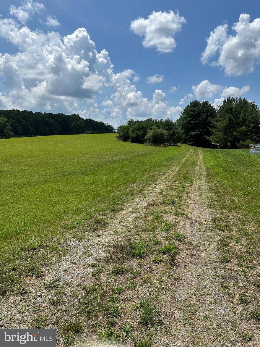 This property has so many possibilities.  Has a cabin ( accessory building ) has 2 bedrooms, 1 bathroom, kitchen and living room.  Central air and electric heat and wood burning stove. 2  spots have been perk approved.  Back to  over 400 acres of State land.  Shed and small paddock on property if you want to bring your horse.   Great for hunting, get away, or whatever you can imagine. Make an appointment today, appointment is required.

Includes 2 tax records