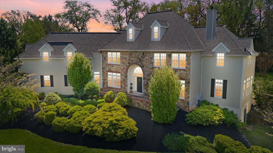 Nestled on a beautifully manicured 1-acre lot within the award-winning Unionville-Chadds Ford School District, this distinguished 5-bedroom, 3 full baths and 31/2-bath residence offers nearly 6,500 square feet of masterfully designed living space. Every inch of this home has been thoughtfully curated with high-end finishes and timeless architectural elements, seamlessly blending refined elegance with modern luxury for an exceptional living experience.
The stately stone and hardie plank façade with a custom Avondale stone front patio with natural slate and brick accents set the tone for what lies within. A grand foyer welcomes you with soaring ceilings, freshly refinished hardwood floors, and a crisp palette of fresh paint that extends throughout the first and second floors.
At the heart of the main level, the formal living room flows into a sun-drenched conservatoryeach anchored by a dual-sided propane fireplace and custom cherry built-ins—perfect for a refined office or relaxing retreat. The family room impresses with 18-foot ceilings and a dramatic Avondale Stone fireplace, creating a warm, central gathering space.
The chef’s kitchen, with newly refinished floors , features granite countertops, Bosch appliances, a Zephyr downdraft vent, and double wall ovens. An octagonal solarium breakfast room provides sweeping garden views and effortless flow for everyday dining or entertaining. A formal dining room adds further elegance for hosting.
French doors lead to a resort-inspired backyard oasis, complete with a European-style 45' x 20' gunite pool, iron-reinforced concrete decking, firepit, diamond-cut stamped-concrete patio, and indoor/outdoor sound system—an entertainer’s dream. The outdoor spaces were designed by the acclaimed Styer’s Landscape Architects , ensuring four-season beauty and ultimate privacy.

Upstairs, the luxurious primary suite includes a Juliet balcony , dual walk-in closets, a custom dressing area with built-in seating, and a spa-inspired bath featuring a steam shower and double-sided fireplace. Four additional oversized bedrooms—each with new premium carpeting —and two full baths (including a Jack-and-Jill with whirlpool tub) complete the second floor.

The walkout lower level expands your lifestyle with a custom wine cellar, media room, home office nook, game area, and a 30’ x 19’ professional-grade gym. A half bath adds convenience,

The home's mechanical systems have been significantly upgraded to ensure long-term comfort and efficiency. Major improvements include a Grand Manor luxury roof by CertainTeed (2021), a full exterior renovation with James Hardie cement siding (2022), and two new 4-ton ICP A/C systems (2022). More recent updates feature a new propane furnace and a 75-gallon Bradford White water heater, both installed in 2024. The laundry/mudroom is well-equipped with a new LG washer and dryer, and an adjacent well was added in April 2025 along with update pool tiles and 3 new pentair pool lights for night swimming to further enhance the property’s infrastructure.

Additional features include a 3-car side-entry garage, first-floor laundry with powder room, walk-up attic storage, and a Gemini 24-hour monitored security system.

Perfectly located with easy access to downtown Kennett Square, Longwood Gardens, King of Prussia, Wilmington, and Philadelphia International Airport, this timeless retreat offers a rare opportunity to enjoy luxury living in one of Chester County’s most desirable settings.
*Taxes are being lowered for 2025. Relevant paperwork is available in the Documents section.