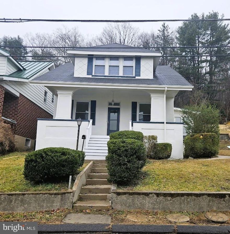 Welcome to 802 Bedford St! This residence has been renovated and updated to make moving in easy and simple. Be greeted by striking curb appeal, a modern exterior palette and newly constructed entrance steps and front porch, perfect for sipping tea and relaxing. Inside, a bright interior with soaring ceilings is anchored by new flooring and designer paint that flows seamlessly throughout the home. To compliment the spacious living and dining rooms, the kitchen is a culinary dream with crisp cabinetry and brand-new stainless-steel appliances perfect for entertaining or creating quiet family meals. Upstairs you will find 3 well sized bedrooms with ample closet space. A completely redesigned full bathroom with modern fixtures and finishes. Located in the unfinished basement is a brand-new sump pump with the electrical, plumbing, AC and furnace systems all in excellent working order. The basement also includes a rough-in for a potential second bathroom. A dedicated and detached 3-car parking pad area has been built in the rear of the home for your convenience. With the empty lot next to the home included in the sale, the potential to build or expand your outdoor living space are endless. Located just minutes from the heart of downtown Cumberland, this home offers the rare opportunity to own a "new" house with classic charm in an established community. Schedule your showing today.