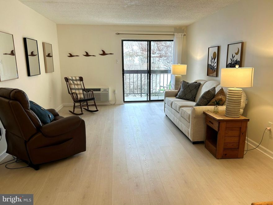 This tranquil and bright modern unit boasts a spacious living room and dining room with sliders
leading to a patio. The well designed efficient kitchen with new appliances offers a food
preparation space apart from the living area. Open shelving enlarges the space and offers easy
reach for dishes and food items. A large hall pantry is a huge asset. The large master bedroom,
with en suite bath, easily accommodates a king bed and still leaves room for a desk or seating
area. A second bedroom is ideal for creative pursuits, a home office, or a guest room. An
additional full bathroom adjoins the hallway. Throughout the unit, you’ll find new flooring,
including plush wall-to-wall carpeting in the bedrooms. There is abundant closet space throughout
the unit. The H-Vac system is newer as is the washer and dryer. A brand new hot water heater
rounds out the updated appliances. This unit is move-in ready. When the weather is inclement
with rain, ice or snow, this is one of a very few units with a valuable DEEDED indoor parking
space which can be leased  to another unit within the Association if not needed. This convenience cannot be overestimated, especially when weather is inclement with rain, ice or snow - no walking outside. Enter from the garage (ramp, no steps) into the newly updated lobby from your parking space and go directly to the elevator. The Crum Creek Association offers resort-style amenities: a community room with full kitchen for family and other gatherings, an outdoor swimming pool, tennis courts, picnic areas, and hiking paths along the creek. The Association is a recognized Gold Star Community for its high standards and fiscal stability, strong sense of community, and well-maintained facilities. Located in award winning Wallingford-Swarthmore School District with easy access to the Blue Route, I-95 and Airport.