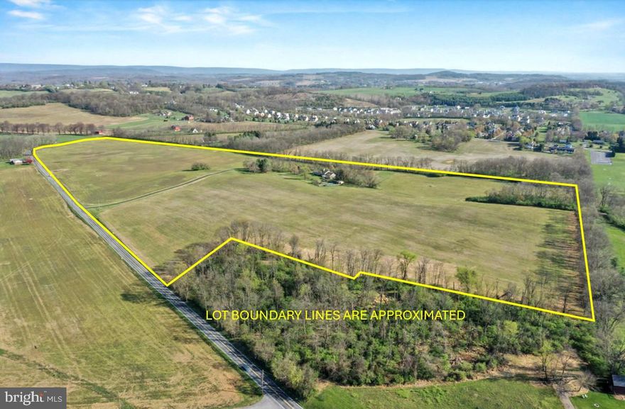 Set on an extraordinary 62 acres in the heart of the highly sought-after Wilson School District, this once-in-a-lifetime farm offers a rare blend of privacy, space, and scenic beauty. With breathtaking views in every direction, this expansive estate provides the perfect backdrop for both peaceful living and unforgettable entertaining. The impressive residence boasts over 4,900 square feet of living space, featuring 4 spacious bedrooms including a owner’s suite on the first floor, 2 full bathrooms, and 1 half bath. Designed with both comfort and functionality in mind, the home offers generous living areas filled with natural light and timeless charm.  Outside, the amenities are just as remarkable. A detached 3-car garage with a dedicated workshop provides ample space for vehicles, hobbies, or storage. The in-ground pool invites you to relax and unwind during warm summer months, while the separate art studio offers a quiet, inspiring retreat for creativity or work-from-home flexibility. Whether you’re looking for a private sanctuary, a place to pursue your passions, or an opportunity to own a truly unique piece of land, this exceptional property delivers it all and yet is only minutes to shopping, restaurants and ammenities.