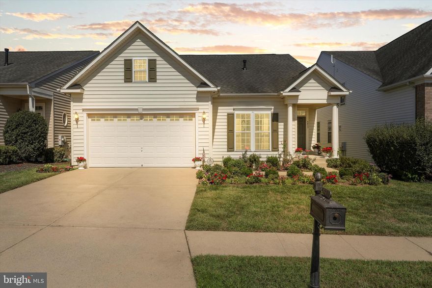 Welcome to this exceptional home in a vibrant 55+ community, where comfort meets convenience. This thoughtfully designed 3 level  three-bedroom, four-bathroom residence offers over 3,800 square feet of living space that seamlessly blends relaxation with functionality.
Step onto the expanded covered front porch and discover an open floor plan filled with natural light. Gleaming hardwood floors flow throughout, complemented by a cozy gas fireplace in family room that creates the perfect ambiance for quiet evenings. The separate living and dining areas provide ideal spaces for both intimate gatherings and entertaining guests.
The heart of the home features a spacious kitchen with upgraded countertops, abundant cabinet space, and modern stainless steel appliances. A convenient pantry ensures storage is never an issue. The bright sun room offers a tranquil retreat, while the main level laundry adds everyday convenience.
The primary bedroom sanctuary boasts elegant tray ceilings, chair rail details, and a luxury bathroom complete with soaking tub and walk-in shower. A second bedroom and full bathroom complete the main level. Upstairs, a versatile loft serves as the third bedroom with its own full bathroom.
Outside, beautiful landscaping frames a generous Trex deck – ideal for morning coffee or evening barbecues. The fully finished recreation room provides endless possibilities, featuring interior access stairs, a full bathroom, and expansive storage areas.
Recent updates include a new heating and cooling system in 2025 and water heater in 2024. With nearby amenities including Publix Super Market, Lee's Parke Club House, and convenient train access, this home offers the perfect blend of peaceful community living and modern convenience.