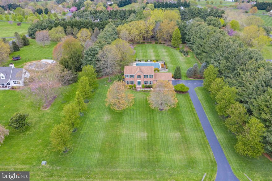 Welcome to 125 St. Clements Way. Located in the community of Strawberry Hill. This stately colonial sits on a well-landscaped lot with mature trees and plantings. The rear yard is a private oasis. Trees and bushes were strategically planted to enclose the rear yard for complete privacy.  This is THE place to entertain. The interior has been meticulously cared for over the years and it shows! There have been recent upgrades that include new flooring throughout the house, updated cabinets in the kitchen with granite countertops, and all of the house has recently been painted.  Hardwood stairs lead to the 2nd floor where you'll find 4 bedrooms, 2 full baths, and a laundry room. The basement has been partially finished and built-in shelving was added for organized storage.  A bilco door leads to the rear yard.  The garage is oversized with a door to the back yard.  Houses like this rarely come on the market. Make sure you see it today!