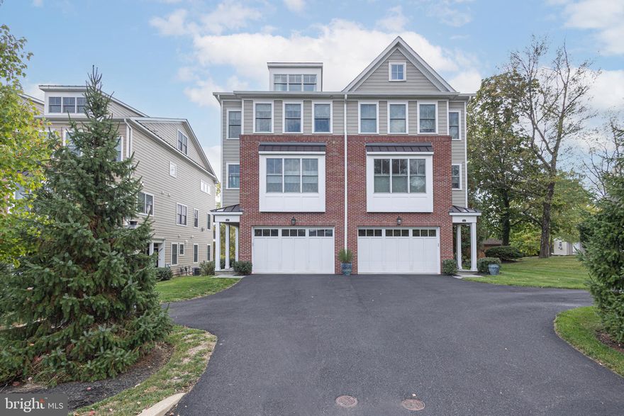 Luxury Townhome in a quaint enclave that looks and feels like new! Enjoy 4 levels of sophistication with multiple outdoor spaces showcasing a tremendous, wooded backdrop and within walking distance of shopping and dining in New Hope! Wonderful natural light from 3 walls of windows on every floor in this exceptionally open layout. Well-maintained and on trend, this home will not disappoint. The Gathering Room boasts a lovely shiplap accent wall, gas fireplace and flows into the Gourmet Kitchen highlighting a large island, neutral palette with open shelving and a crisp subway backsplash, a suite of stainless appliances and more making it a bright and comfortable space for everyday enjoyment. An upscale elevator for convenient access to all levels, private 4th floor offering wonderful flexibility and can be utilized as an additional bedroom with full bath or the perfect space to work from home. Additional amenities include a 2 car garage with epoxy floors and storage room, electric car charger, additional driveway parking, picturesque views, high ceilings, neutral palette throughout, and wide plank hardwood flooring. Low maintenance living in a tremendous location with quick access to the Rt 202 corridor, New Hope Boro and Lambertville for entertainment in the highly desired river towns.