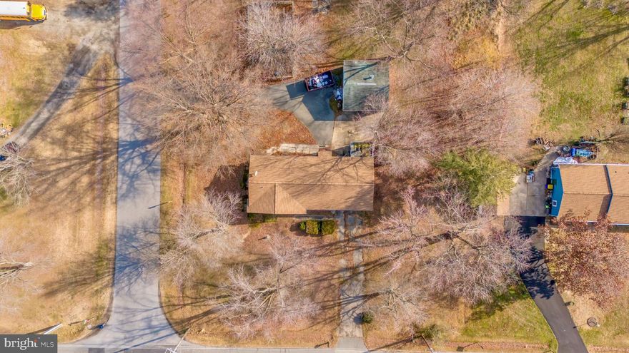 Located in the heart of Stevensville, this 3-bedroom, 1-bath rancher offers a prime opportunity for renovation, investment, or potential redevelopment. The property is within close distance to local schools, parks, and downtown Stevensville, and is approximately ½ mile from the Cross Island Trail, providing convenient access to miles of paved walking and biking paths across Kent Island. Downtown Stevensville shops and restaurants are just a few blocks away, while the Chesapeake Bay Bridge is located roughly 2 miles away, offering quick access to the western shore. The property is served by town water and sewer. Per preliminary conversations with Queen Anne’s County, the parcel may have the potential to be subdivided into two to three lots of approximately 8,000 square feet each; however, all subdivision potential, zoning, and development feasibility must be independently verified by the buyer. This centrally located property combine infrastructure, and future upside in one of Kent Island’s most convenient areas. This property is in need of repairs to the main beam and joists.