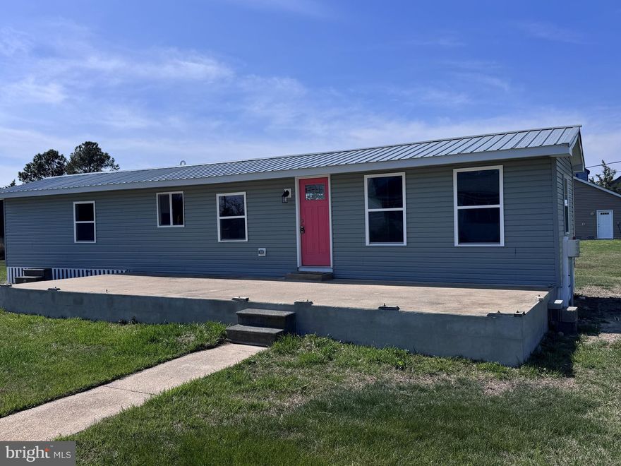 Enjoy Piney Point living at an incredibly affordable price.  
This home feels completely like new, giving you the comfort of moving in with no projects and no stress. The layout is simple and welcoming, with two bedrooms and one bath separated by a bright great room and kitchen. The kitchen island offers extra lighting and space for stools, making it a natural gathering spot. Whether you’re looking for a weekend retreat or a full‑time escape, this home has everything you need — including a lovely water view. The front porch area offers even more potential: enclose it someday for a screened‑in porch or enjoy it just as it is now while you relax and soak in the peaceful surroundings.
A perfect little getaway near the water, ready for you to start living the good life.