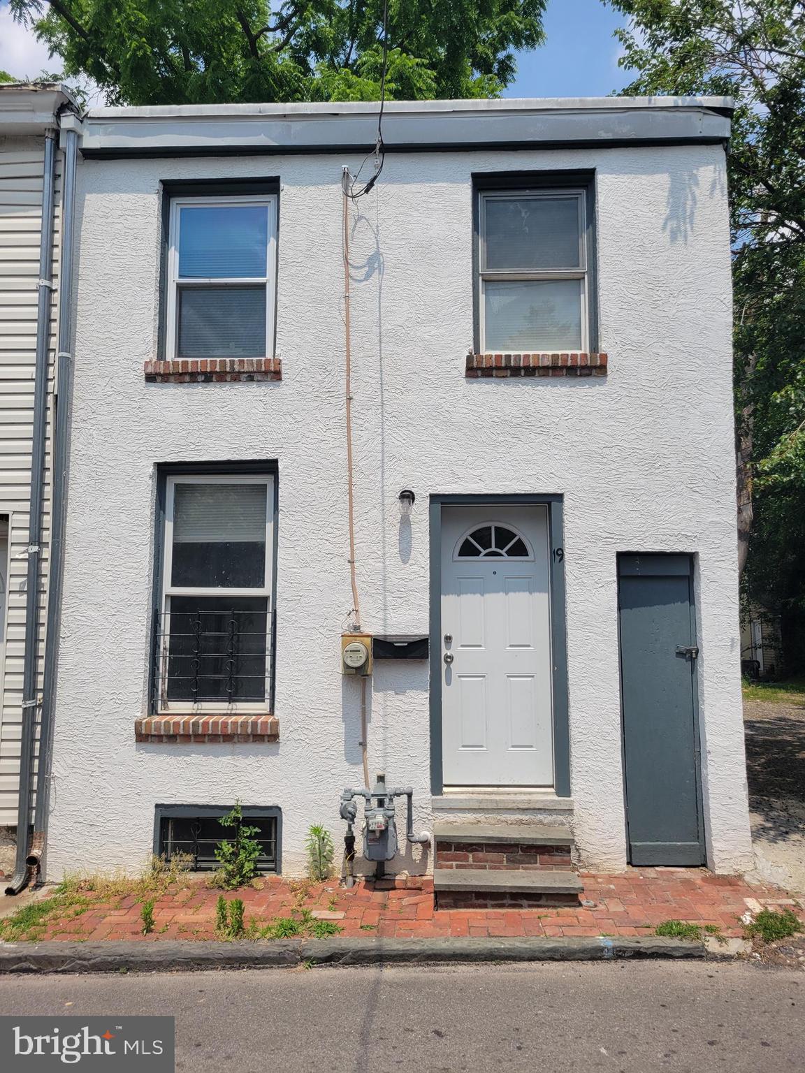 Investor Alert! Tenant occupied at $1500/mo income for you. Tenant pays all utilities. Recent updates have been done to this cozy two bedroom home on a quite side street in the heart of Norristown. Newly renovated full bathroom, new luxury vinyl plank flooring throughout, as well as a newer kitchen with gas stove, hood fan and refrigerator. Roof is newer too. Paved area in back provides a nice private spot and covered back porch. One dedicated parking place next to the house. Just a short walk to Norristown Transportation Center, library, post office, restaurants, grocery stores, and drug store. Close to several town parks, such as the beautiful Elmwood Park, the G. Washington Carver Community Center and pool, and Elmwood Park Zoo.