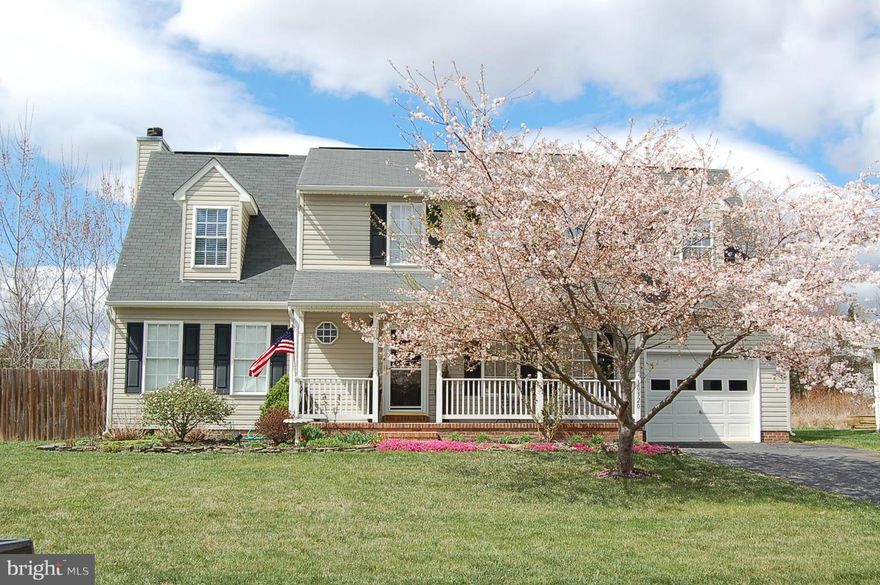 Beautiful Colonial near the SP VRE,I95 and Downtown FB, . Property adjoins a common area on 2 sides that cannot be built on.  Many upgrades that you will enjoy.   Large deck & slate patio overlooking the landscaped lawn with flowers, garden, shade and fruit trees. Heated Floor in MBA.  Garage features storage loft, cabinets and work bench.